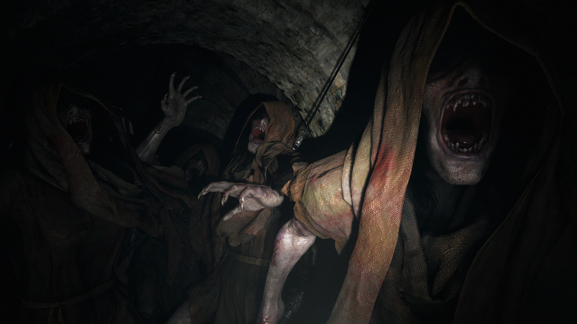 A screenshot from the video game Resident Evil Village showing undead monsters in cloaks in a dark underground dungeon.